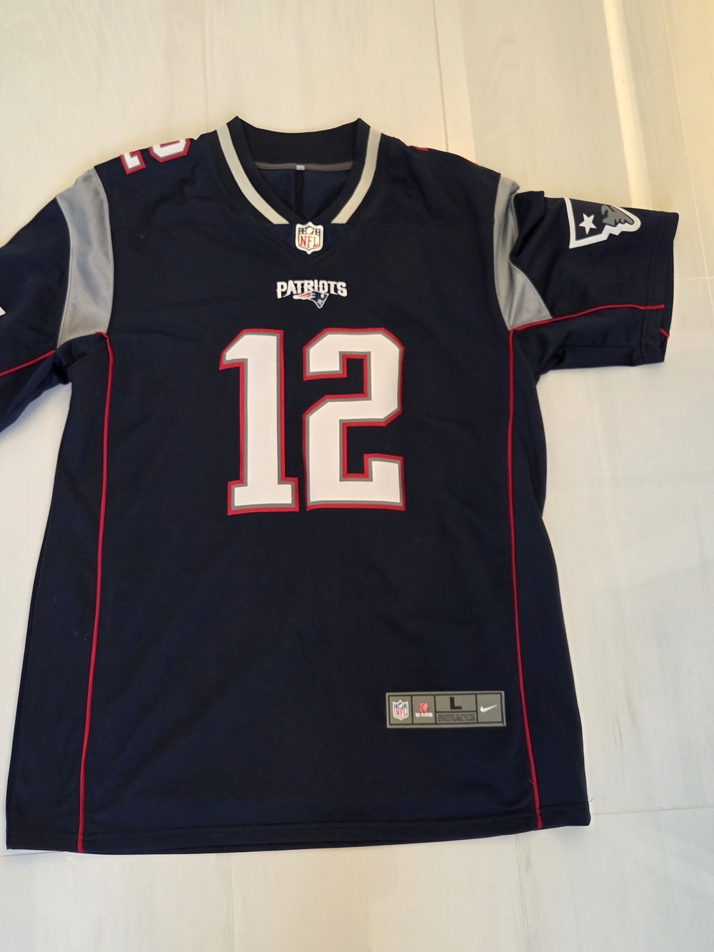 Tom Brady #12 New England Patriots NFL Jersey – Men’s Large (Navy Blue)